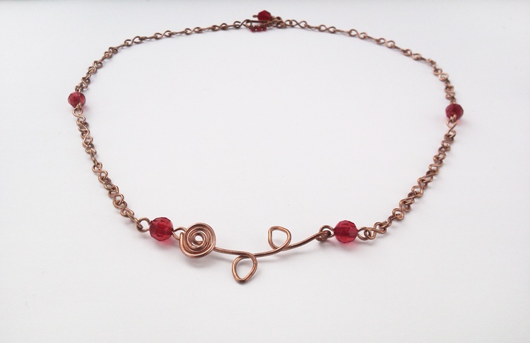 ketting met roosmotief van koperdraad