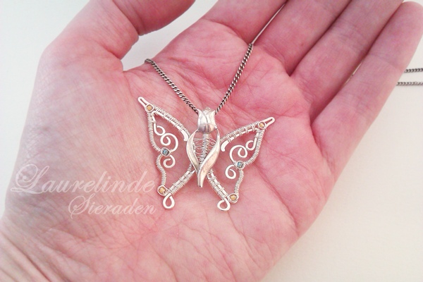 Tulp en vlinder rouwsieraad